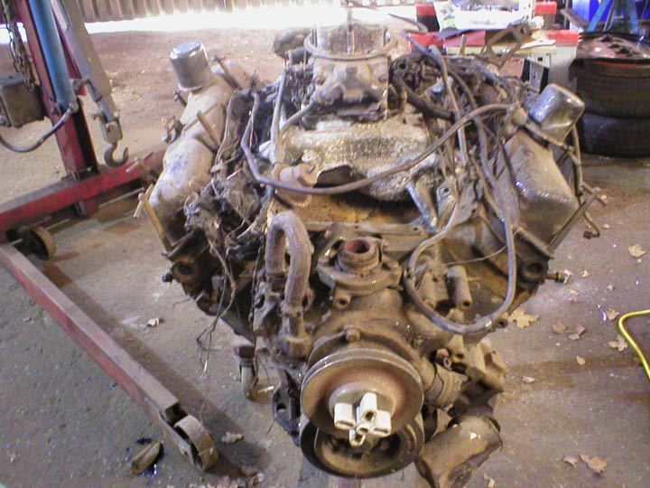 Partially siezed and been on fire, nothing a quick slosh of hammerite with a 4'' brush won't sort out.