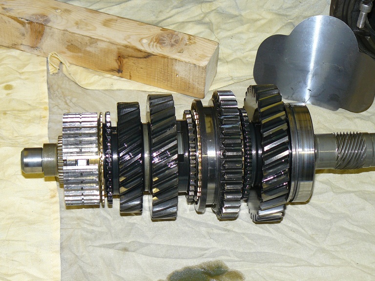 Right to Left: 1st, rev, 2nd, 3rd (4th is on input shaft)