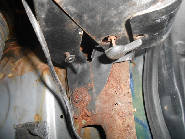 Bolt attaching dash to body in footwell