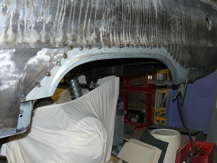 03 Wheel arch tacked.jpg
